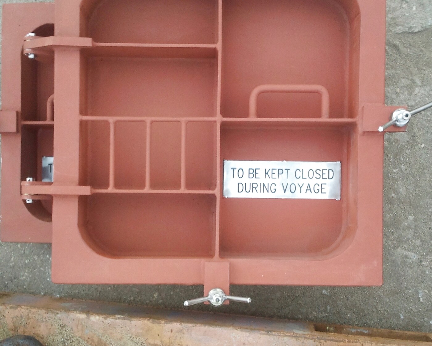 Rectangular marine closure with eye-bolt handle and kept-closed plate