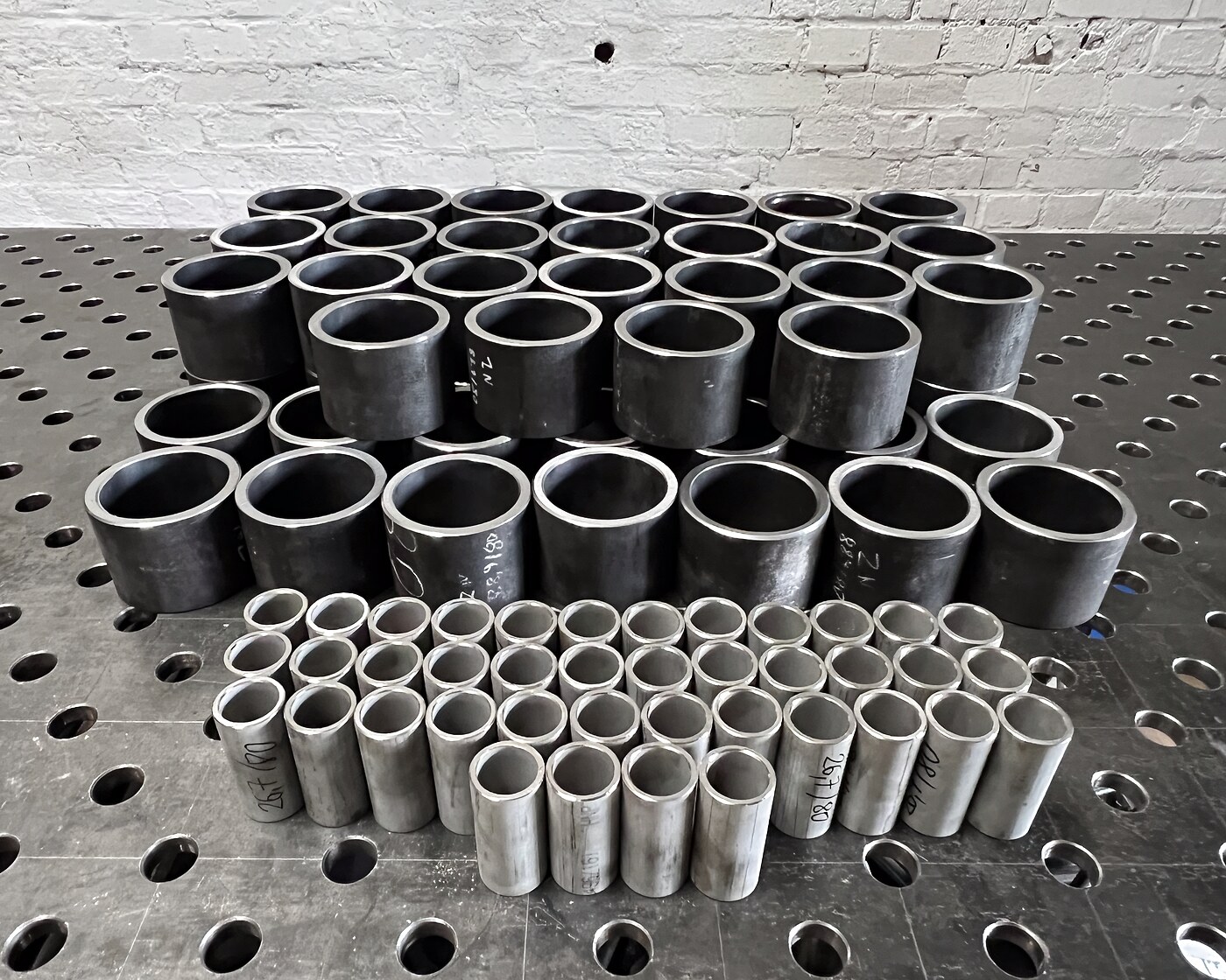 Serial stainless-steel pipe sections and sleeves